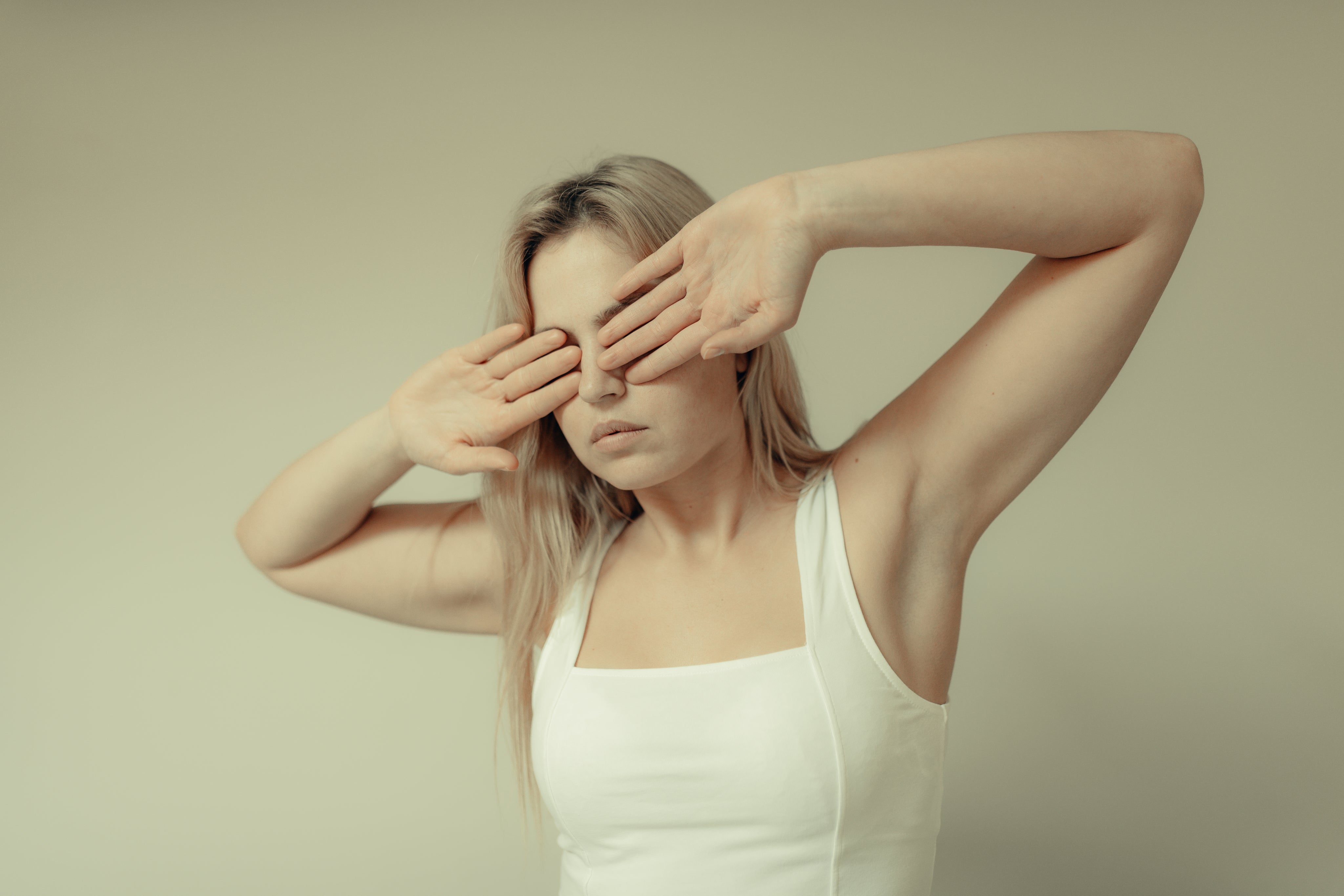 files/woman-stands-and-covers-her-eyes-with-her-palms-outwards.jpg